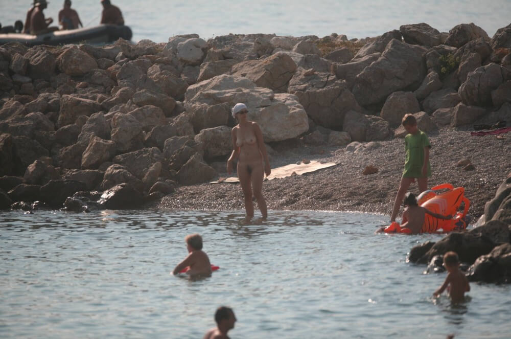 FKK cove pyramid in waters - Nudism and naturism are a path to natural harmony and inner wholeness