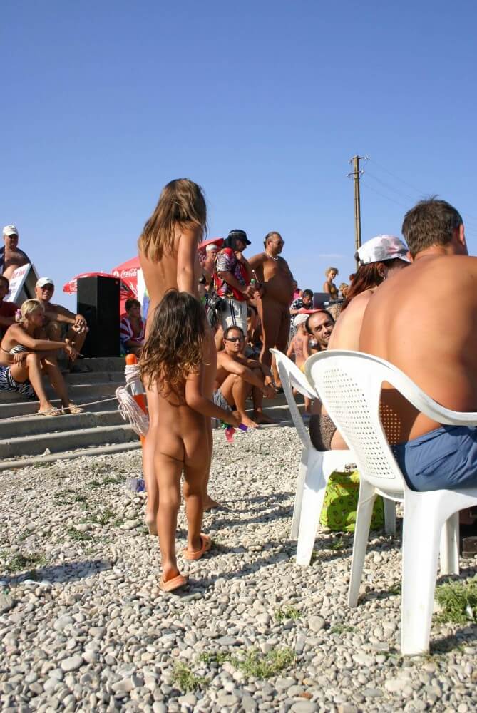 Naturist Standing Sideline - Naturism and nudism are a philosophy of respect