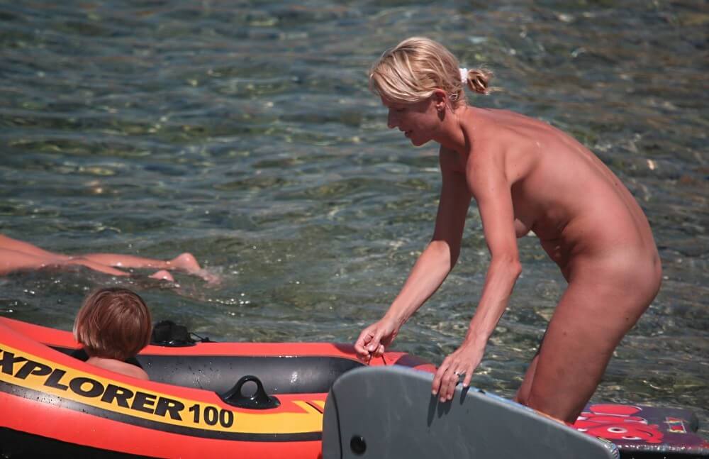Red Boating for Two Nudists pics - Family nudism in its cultural context