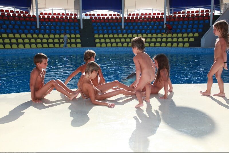Swimming dolphins photo gallery - Nudism and naturism are closer to natural harmony