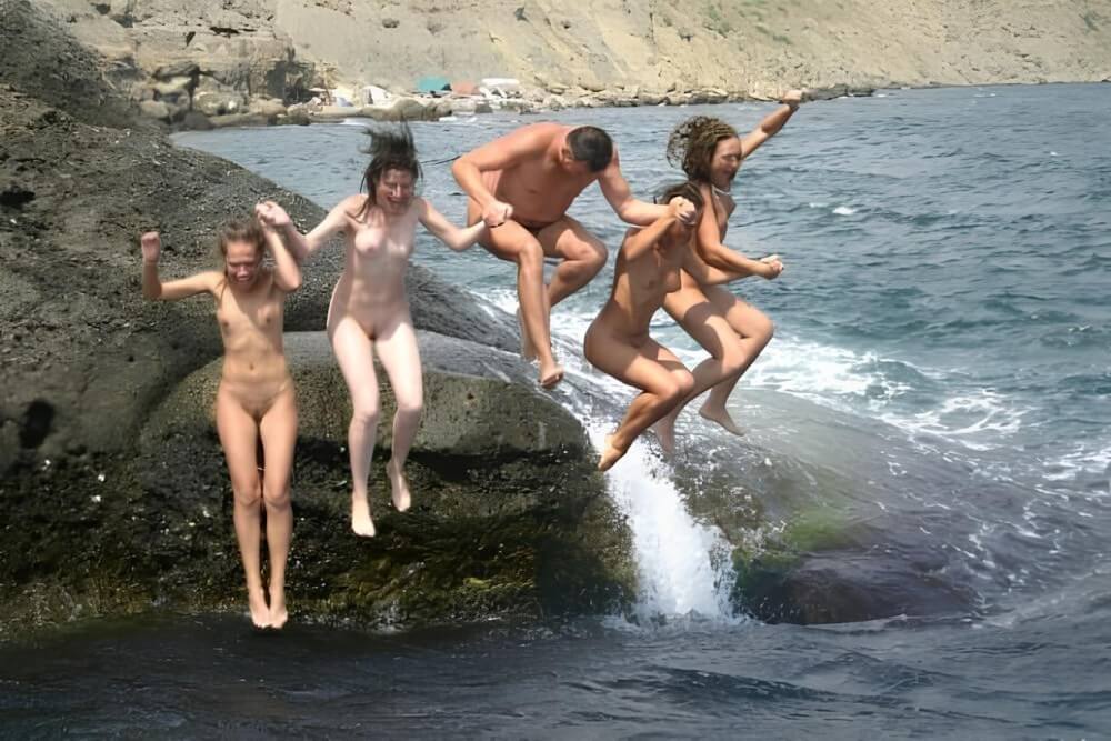 Mens and girls nudists on a beach - Striving for harmony with nature—its okay to be a little naked