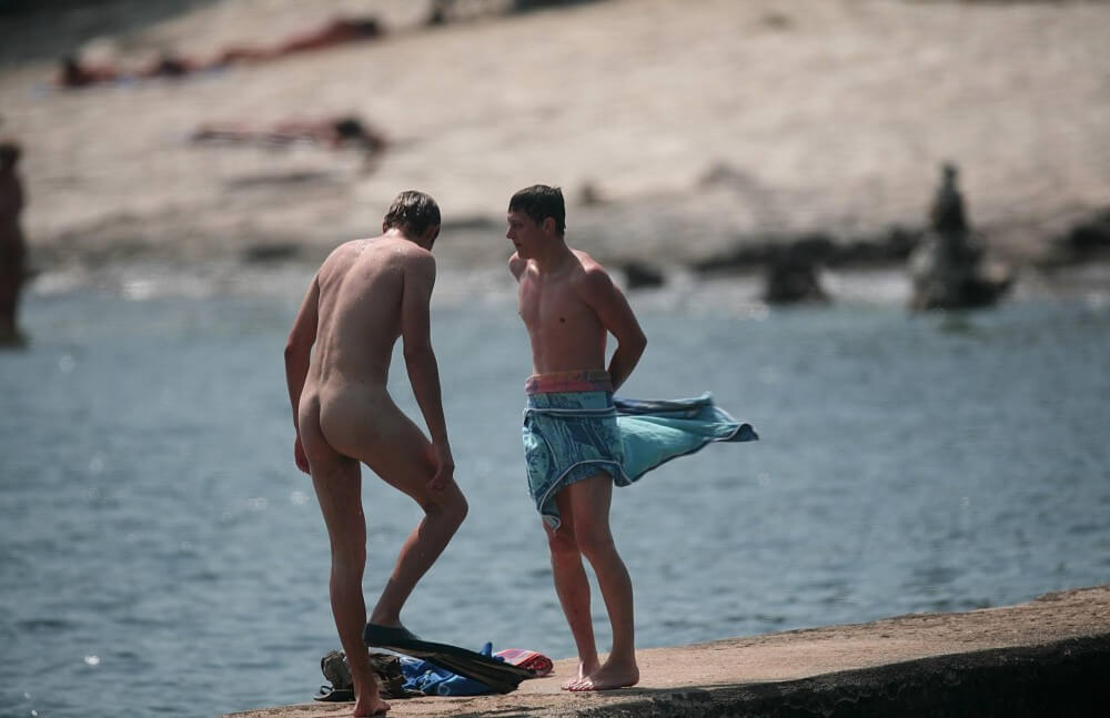 Nudists Boys - Water Prep On The Ledge - World Naturist Federation