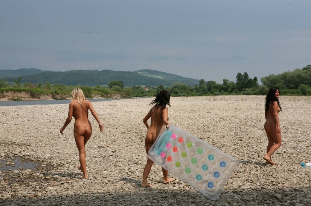 Naturist Park Floating On River photos - Naturism teaches us to accept everyones differences and unique qualities without embarrassment