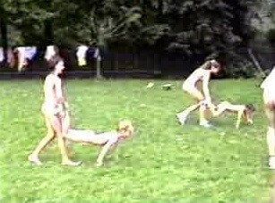 A nudist gathering at the stadium and sports - The equality of naked human bodies helps us accept ourselves and others