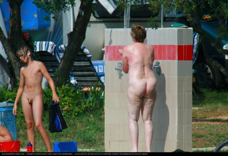 Covered in Towel Nudists-Boardwalk Biking - Naturism teaches us to accept differences and imperfections without shame or insecurities
