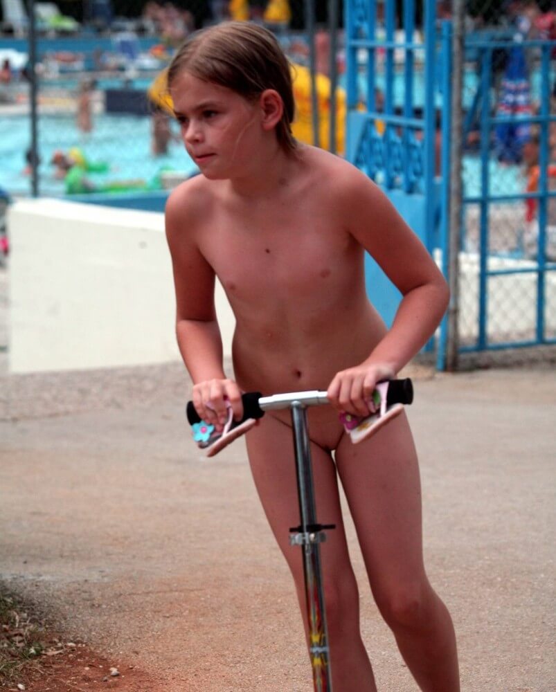 Pool-Side Naturist Scooter pics - The cult of nudity has not been forgotten
