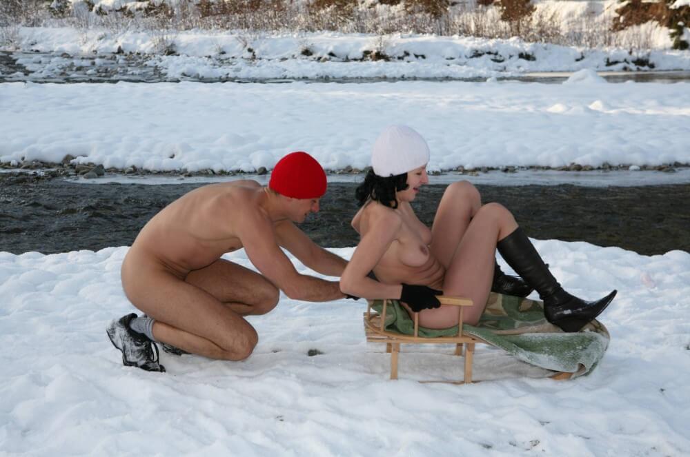 Naturist Girl Snow Day Couples Sled pics - Joy and pleasure are part of the nudist experience