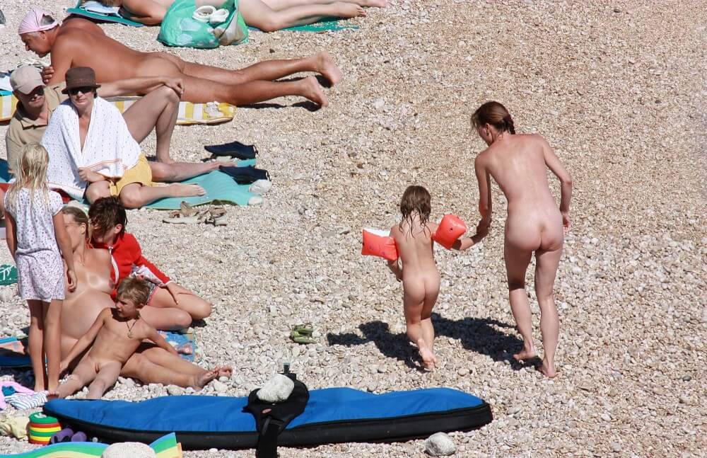 Orange Floaty Safety First Naturist pics - Promoting nudism to the masses